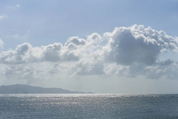 Blue sky with clouds over sea water. Nature composition. — Stock Photo, Image