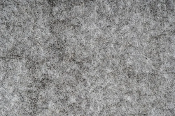 Tejido de punto de brezo gris hecho de fibras sintéticas con textura de fondo. Textura de tejido de punto gris. Fondo con delicado patrón de rayas — Foto de Stock