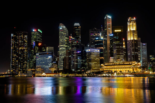 Singapore city, Singapore - february 26, 2020 : Singapore Skyline and view of skyscrapers on Marina Bay at night . Singapore cityscape of the financial district