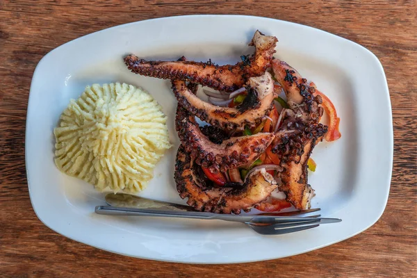 Fried Octopus Tentacles Mashed Potato Vegetable Salad White Plate Close — Stock Photo, Image