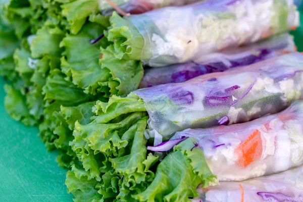 Wrapped Rice Noodles Green Lettuce Leaf Carrot Blue Cabbage Close — Stock Photo, Image