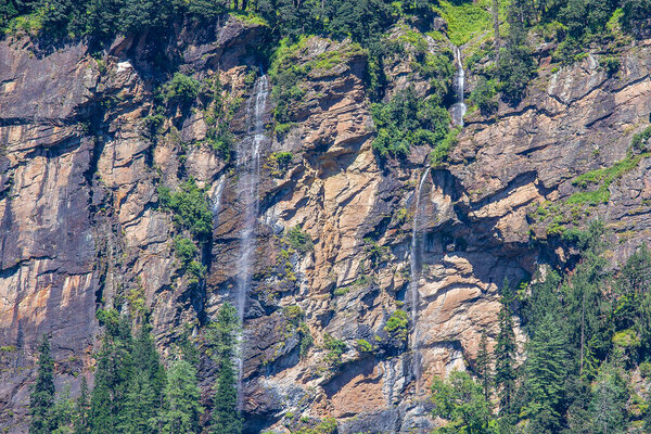 Waterfall in Rohtang valley, Himachal Pradesh, India while travel from Manali city to Rohtang Pass. Nature concept