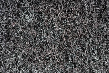 Karanlık soyut arka plan ve birbirine geçmiş saç telleri, lifler ve nanofiberler. Sünger detay dokusu, sünger dokusu arkaplanı kapat. Selüloz sünger dokusu. Siyah ve beyaz