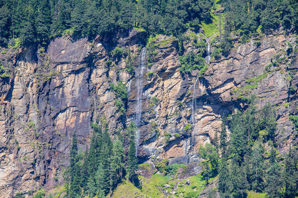 Waterfall in Rohtang valley, Himachal Pradesh, India while travel from Manali city to Rohtang Pass. Nature concept