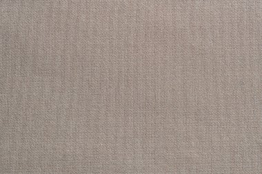 Arka planda bej kumaş tekstil dokusu, kapat, üst görünüm