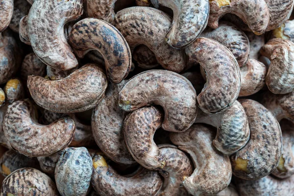 Rostade Cashewnötter Med Skal Bakgrunden Närbild Ovanifrån Vietnam — Stockfoto