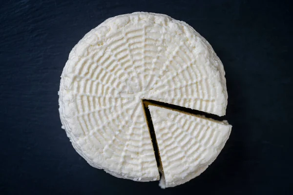 Homemade soft white cheese on black slate background, close up, top view. Home cheese making. Adyghe cheese from milk — Stock Image Homemade Soft White Cheese Black Slate Background Close Top View Stock Photo