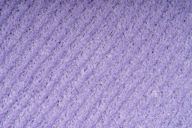 Ev temizlik süngerleri kapanıyor. Sünger detay dokusu, sünger dokusu arkaplanı kapat. Selüloz mor sünger dokusu. Sünger yüzey arka planında tel örgüsü