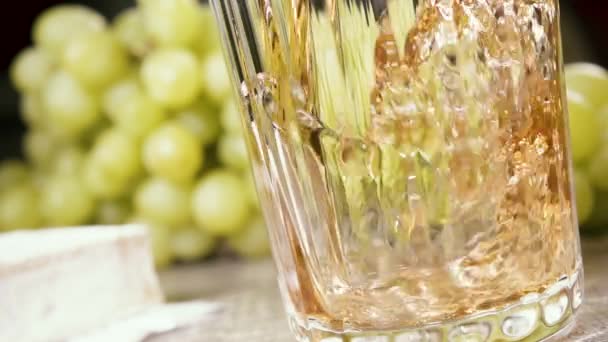 Slow motion pour the wine into a glass and appetizer — Stock Video