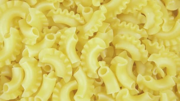 Achtergrond pasta draaien met de klok mee bovenaanzicht — Stockvideo