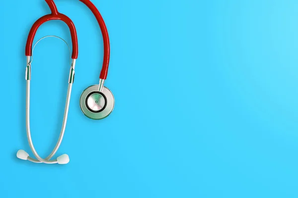 Üstten Görünüm Stetoskop Mavi Arka Plan Kalp Sağlık Tıbbi Teknoloji — Stok fotoğraf