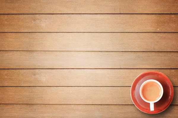 Φλιτζάνι καφέ εσπρέσο σε ξύλινο φόντο τραπεζιού. — Φωτογραφία Αρχείου
