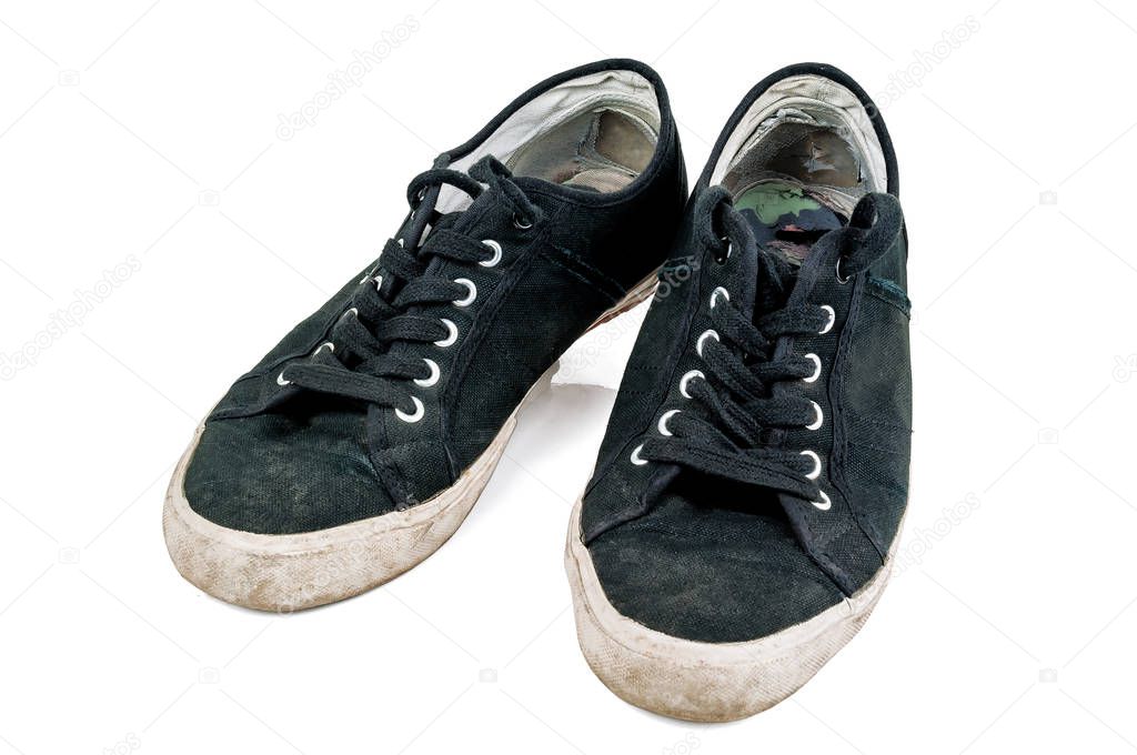 old dirty sneakers isolated on white