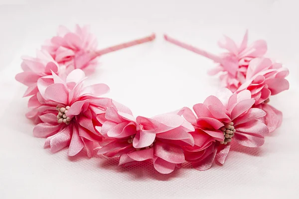 Baby hair accessory with pink flowers on white background — Stock Photo, Image