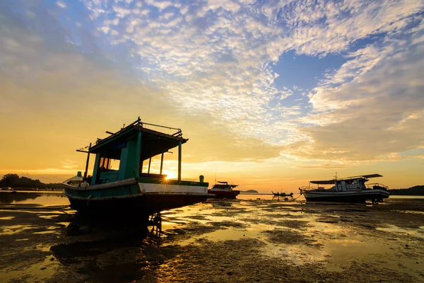 Twilight Morning Light with Silhouette boat at Rawai beach Phuket Thailand.