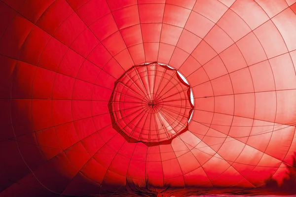 Inside a red hot air balloon