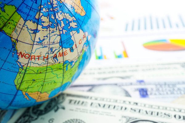 Bangkok, Thailand - October 14, 2018 : Globe world map on chart graph paper. Finance, Account, Statistics, Investment, Analytic research data economy and Business company meeting concept.