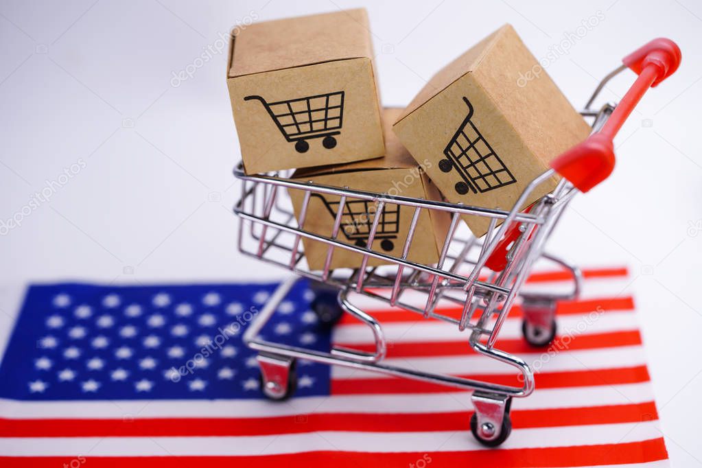 Box with shopping cart logo and USA America flag : Import Export Shopping online or eCommerce delivery service store product shipping, trade, supplier concept.