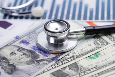 Stetoskop, Grafikler ve Grafikler elektronik tablo kağıdı, Finans, Hesap, İstatistik, Yatırım, Analitik araştırma veri ekonomisi elektronik tablosu ve İşletme şirketi konsepti