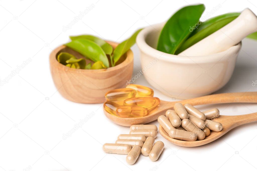 Alternative medicine herbal organic capsule with vitamin E omega 3 fish oil, mineral, drug with herbs leaf natural supplements for healthy good life.