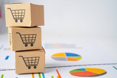 Grafik arka planında alışveriş arabası logosu var. Bankacılık Hesabı, Yatırım Analitik Araştırma Veri Ekonomisi, Ticaret, Ticari İthalat İhracat İhracat Taşımacılığı Çevrimiçi Şirket Konsepti.