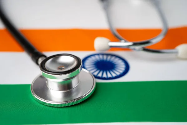 Black stethoscope on India flag background, Business and finance concept.