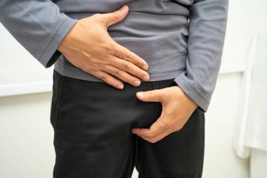 Fıtık, Asyalı erkek mide ağrısı, karın ağrısı ve üroloji problemi..