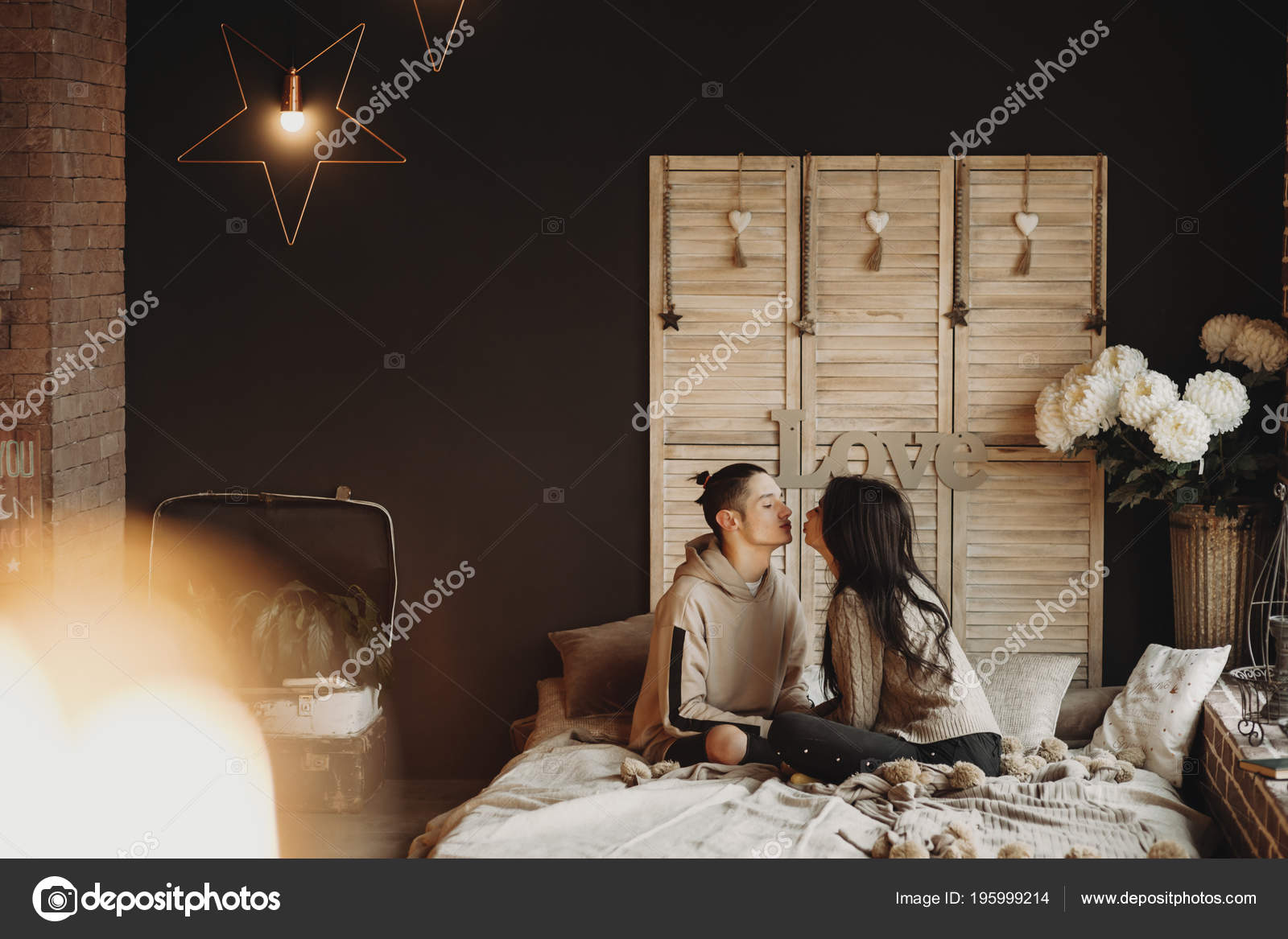Couple Lying Bed Cozy Room Kissing Stock Photo