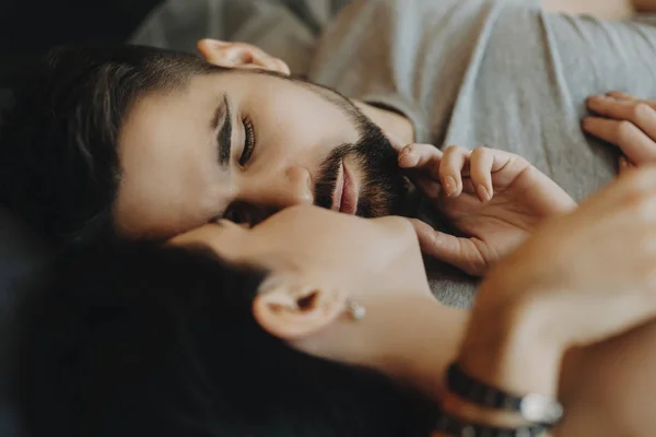 Close Portrait Handsome Bearded Man Leaning Bed Looking Her While — Stock Photo, Image