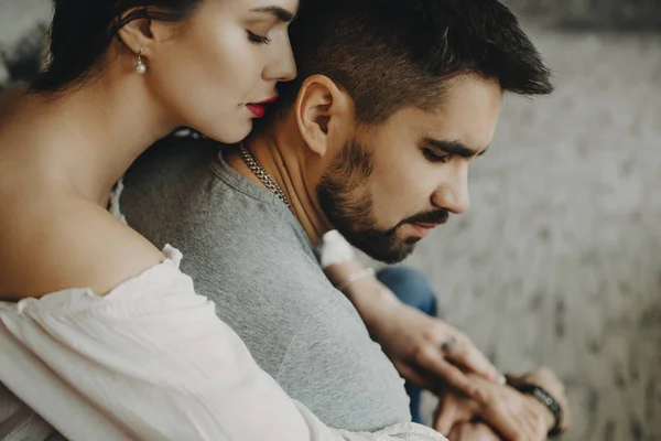 Close Portrait Beautiful Couple Sitting Red Chair Woman Whispering Loving — Stock Photo, Image