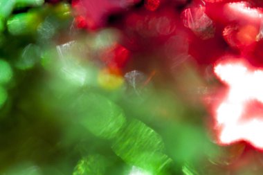 Soyut sıkıcı yemyeşil ve vinous Parlatıcı bokeh arka plan üzerinde kirişler