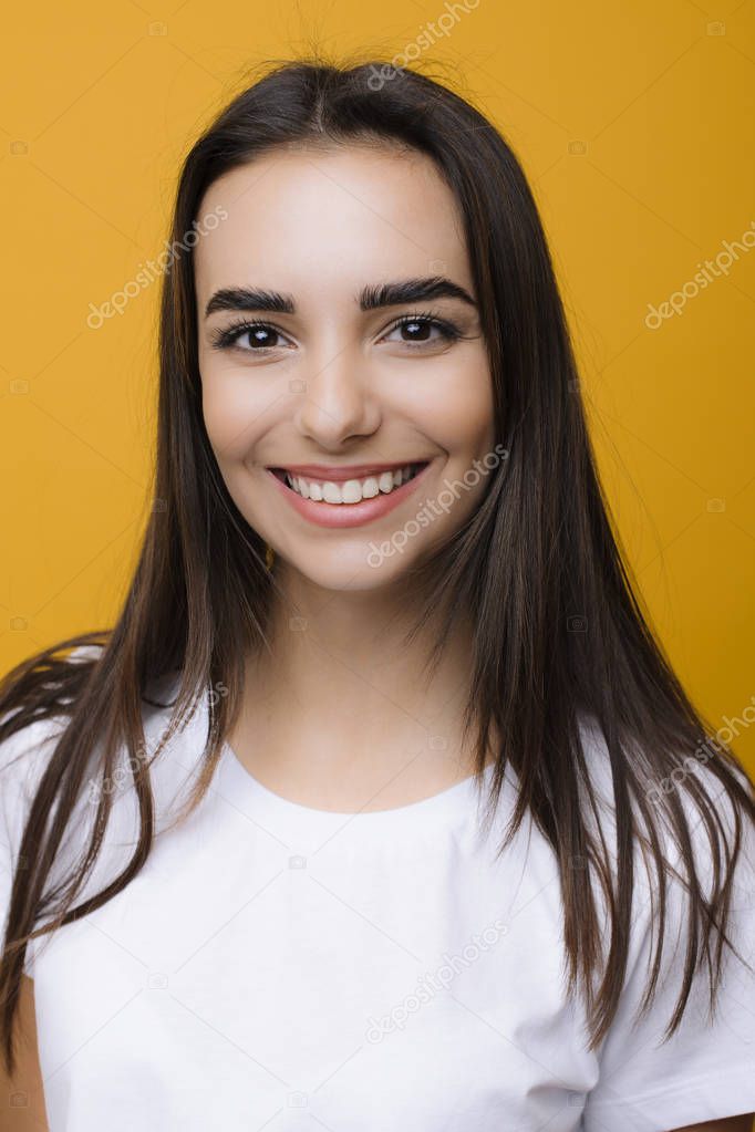 Portrait of a amazing caucasian woman with dark long hair and dr