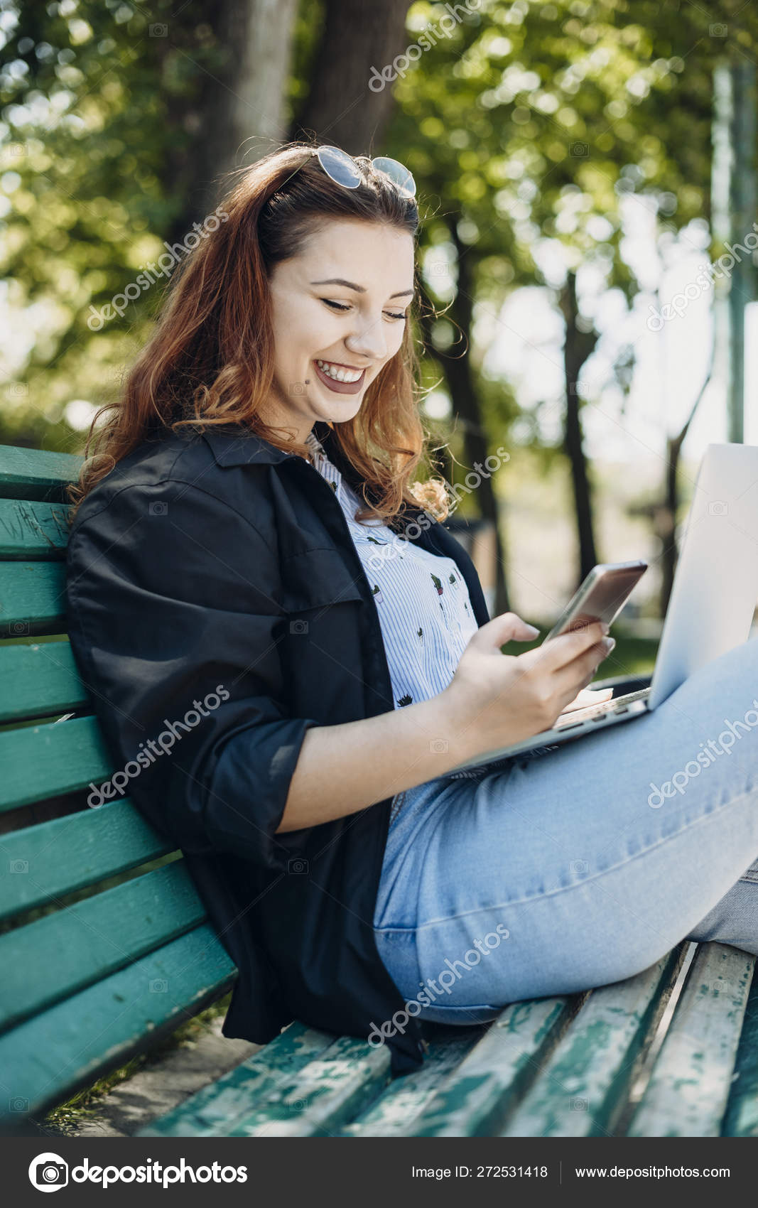 Portrait Of A Beautiful Plus Size Woman Sitting On A Bench In Th