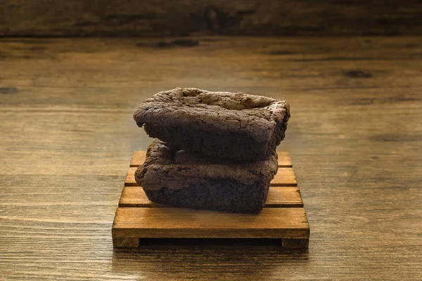 The Chocolate Brownie on the pallet wood has ready to served in the dessert time.