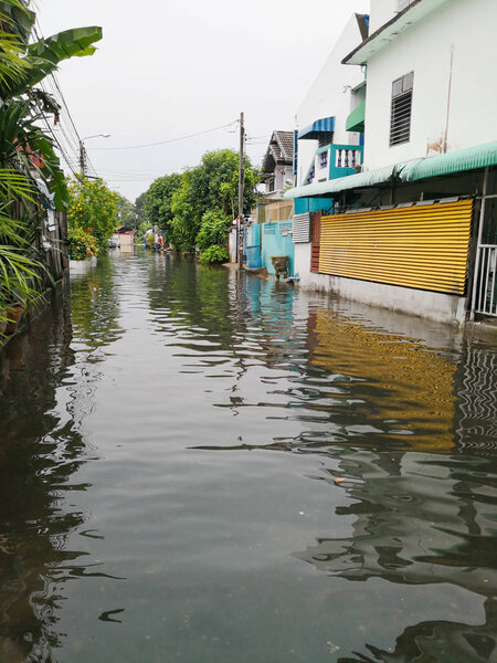 Flooded village after heavy rain in Bangkok, Thailand.