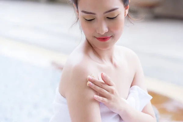 Portrait of beautiful asian people having hand massage in spa salon. Beauty, healthy, spa and relaxation concept.
