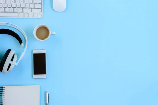 The office blue desk and equipment for working with coffee in to