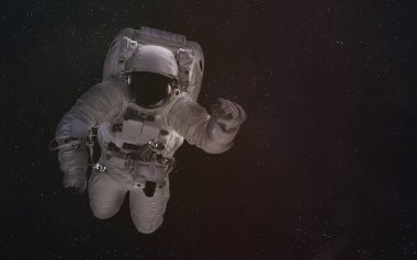 Tek astronot uzayda. Bu görüntü unsurları Nasa tarafından döşenmiş.