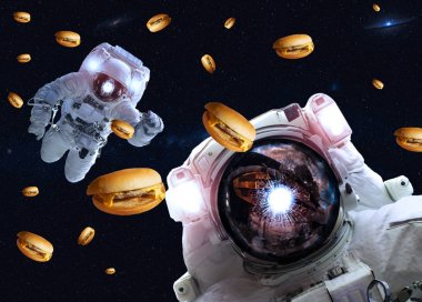 Astronotlar uzayda cheseburgers ile. NASA tarafından döşenmiş bu görüntünün elemanları