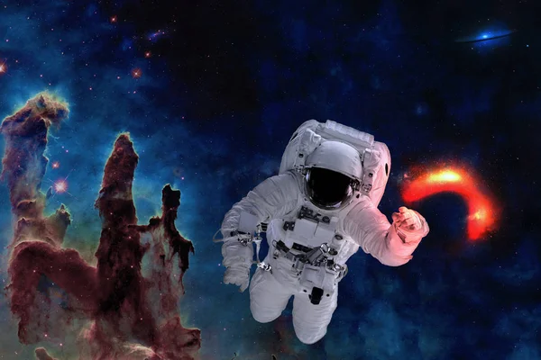 Space astronaut near black hole red glow.