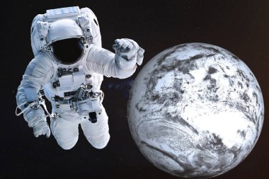 Donmuş Dünya gezegeninin yakınında bir astronot.