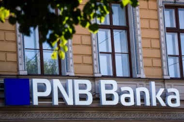 RIGA, LATVIA. 16th August, 2019. Logo of PNB Bank on facade. PNB Bank (formerly known as Norvik Bank). PNB Bank shut down after European Central Bank (ECB) announcment. clipart
