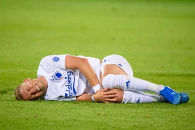 Riga, Letonya. 29 Ağustos 2019. Viktor Fischer, Uefa Avrupa Ligi Play-off 2 ayak futbol maçı sırasında takım Riga Fc ve takım Kbenhavn arasında çim üzerinde yatan. Skonto stadyumu, Riga.