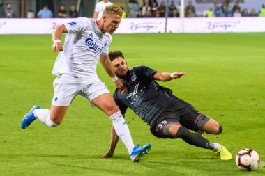 Riga, Letonya. 29 Ağustos 2019. Herdi Prenga (R) takım Riga Fc ve takım Kbenhavn arasında Uefa Avrupa Ligi Play-off 2 ayak futbol oyunu sırasında eylem. Skonto stadyumu, Riga.