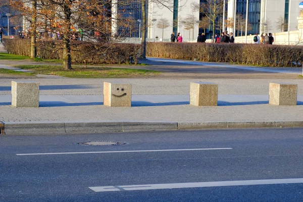 Street smile with brick cubes