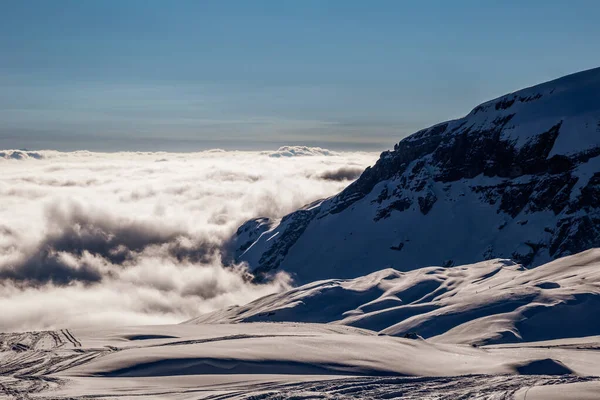 Inverse clouds illuminated by the sun in the Alps — Stock Photo, Image