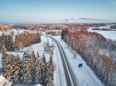 Aerial view of a road in winter. clipart