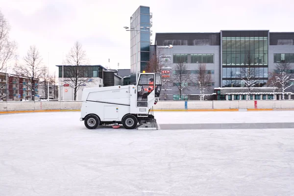 Ice resurfacer to clean and smooth the surface of a sheet of ice rink — Stock Photo, Image