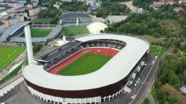 Helsinki, Finlandiya - 1 Ağustos 2020: Helsinki Olimpiyat Stadyumu yenilendikten sonra Arial görünümü.