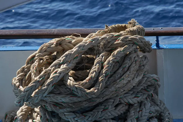 Pile Of A Rolled Up Worn Ship Rope